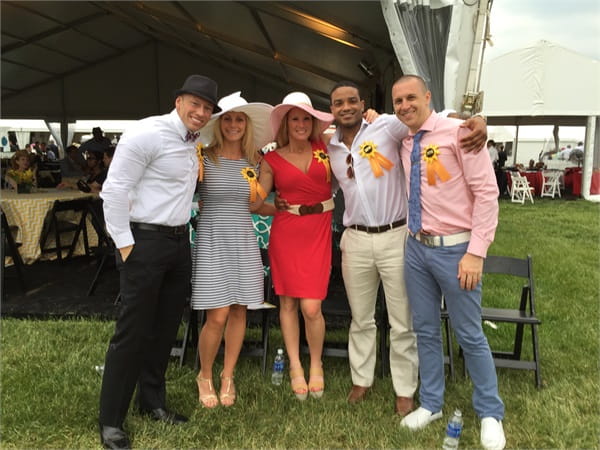 Residents enjoying the Preakness at the Pimlico Race Course in Baltimore, Maryland.